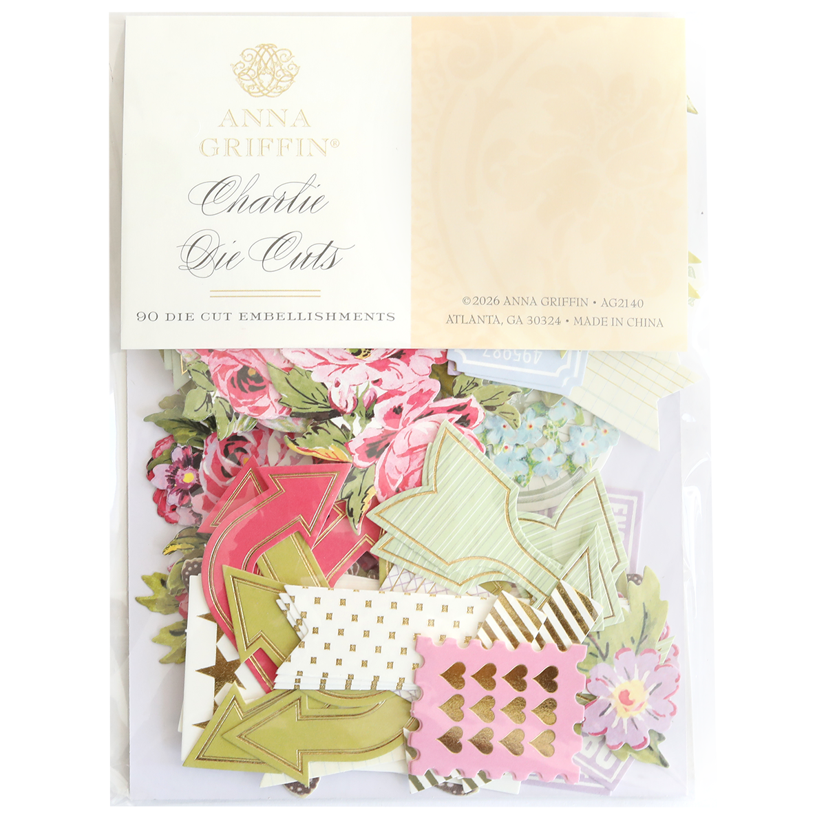 A package of Charlie Die Cut Embellishments contains assorted floral and patterned die cuts, including arrows and decorative shapes—ideal for craft supplies or scrapbook embellishments.