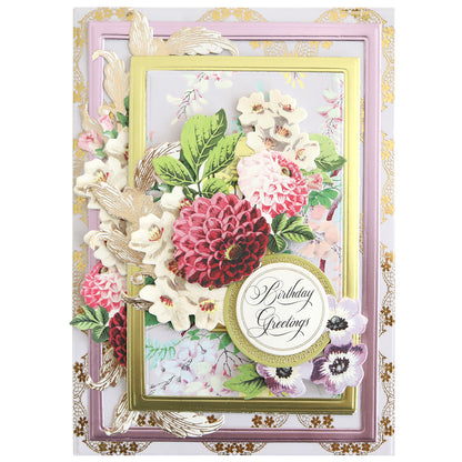 A decorative birthday card made with Concentric Rectangle Dies, featuring layered pink, white, and red flowers with gold accents and "Birthday Greetings" in a circular frame—perfect for card making or scrapbooking.