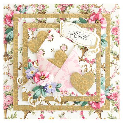 A decorative greeting card featuring floral patterns, a gold-embossed heart, an envelope, and a "Hello" tag on a layered background—ideal for shaker cards crafted with Concentric Square Dies.