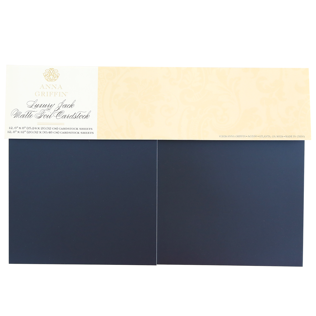 A pack of Luxury Jack Matte Foil Cardstock includes two sheets of dark blue matte foil cardstock with a beige label on top—ideal for handmade cards and scrapbooking projects.