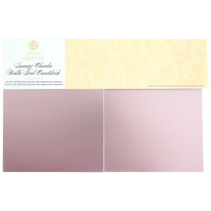Luxury Charlie Matte Foil Cardstock in light pink comes in a pack with two rectangular sheets side by side, ideal for elegant die cuts and sophisticated crafting projects.
