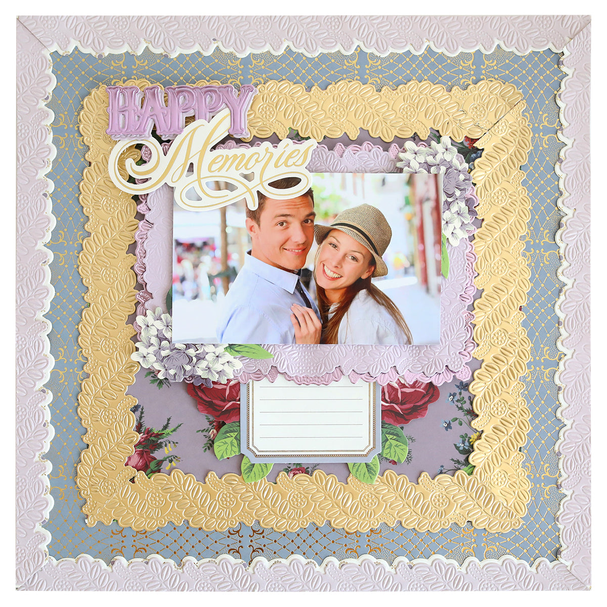 A scrapbook page displays a smiling couple's photo, adorned with layered ornate borders made using the Happy 3D Frame and Border Dies, floral accents, and "Happy Memories" at the top.