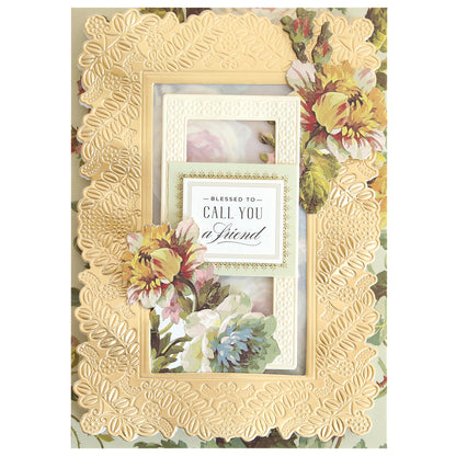 Greeting card featuring an embossed gold floral frame created with Happy 3D Frame and Border Dies, pastel flowers, and the sentiment "Blessed to call you friend" in the center.