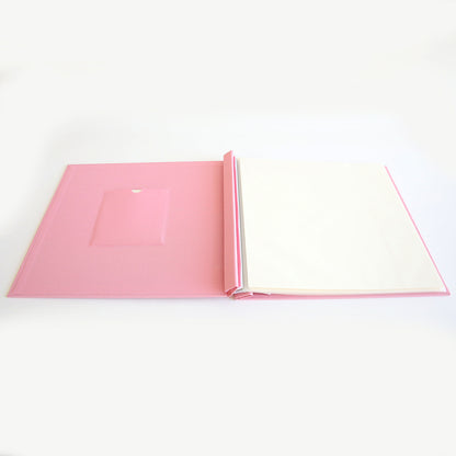 The Rose Pink Post Bound Scrapbook Album features a blank white page and a small inside cover pocket, ideal for memory keeping, all set against a plain white background.