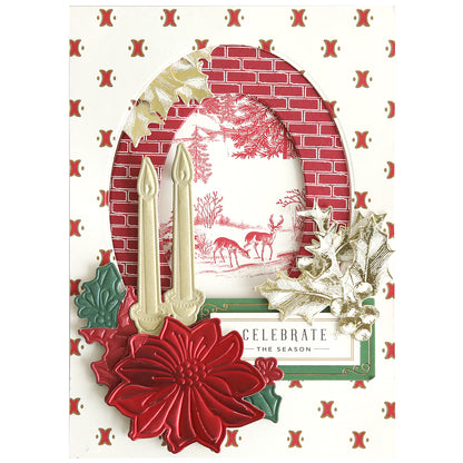 Holiday card featuring a red brick and holly design, gold candles created with the 3D Holiday Candlelight Scene Dies, a vibrant red poinsettia, and an oval window displaying two deer in a snowy forest. This layered Christmas card is ideal for paper crafting enthusiasts. The sentiment "Celebrate the Season" adds a festive touch.