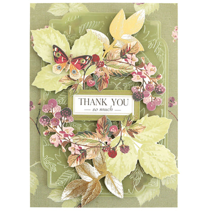 The Sienna Cardstock and Embellishments set features a decorative card adorned with illustrated leaves, berries, and a butterfly, plus the message “Thank You so much” in the center—ideal for autumn scrapbook projects or fall card making, all crafted from quality cardstock.