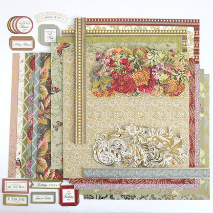 The Sienna Cardstock and Embellishments set features patterned scrapbook papers with floral, leaf, and ornate designs, paired with a variety of decorative greeting labels and tags—perfect for autumn paper crafting or bringing a seasonal flair to your Thanksgiving scrapbook projects.