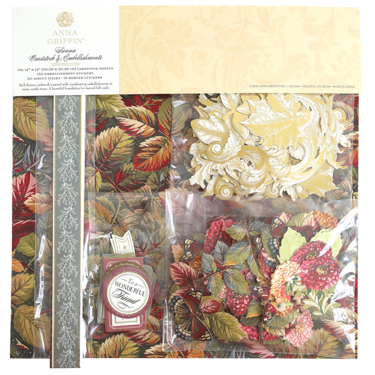 The Sienna Cardstock and Embellishments set features autumn leaf designs, decorative cardstock, and die-cut pieces in shades of red, green, gold, and cream—perfect for fall card making and Thanksgiving scrapbook supplies.