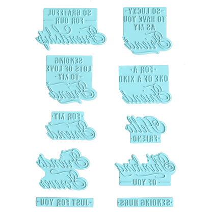 Ten light blue silicone stamps featuring a variety of positive messages, ideal for creating hot foil sentiments or using alongside the Gilded Friendship Sentiment Foil Plates on handmade cards, arranged in two vertical columns on a white background; text appears reversed for stamping purposes.