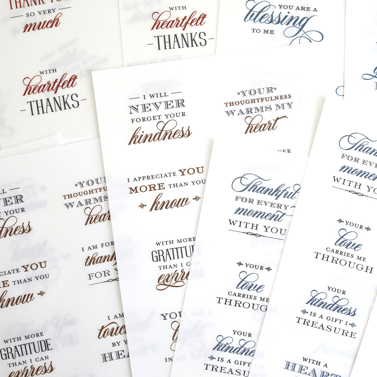 With Gratitude Sentiment Rub Ons feature sheets of paper covered in decorative gratitude and appreciation phrases, like “Thank you so very much” and “Your thoughtfulness warms my heart.” These rub on transfers are perfect embellishments for adding heartfelt thank you sentiments to your papercrafting projects.