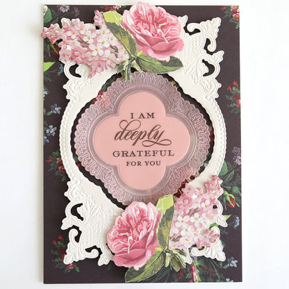 With Gratitude Sentiment Rub Ons feature ornate floral designs with pink roses and lilacs, as well as a central message that reads, “I am deeply grateful for you.” Perfect for expressing heartfelt appreciation, this elegant design is an ideal addition to your papercrafting supplies.