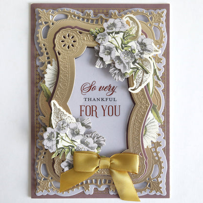With Gratitude Sentiment Rub Ons feature ornate gold frames, white flowers, a yellow ribbon, and the text “So very thankful for you” in red and brown letters—a charming design that captures thank you card sentiments and is perfect for pairing with your favorite papercrafting supplies.