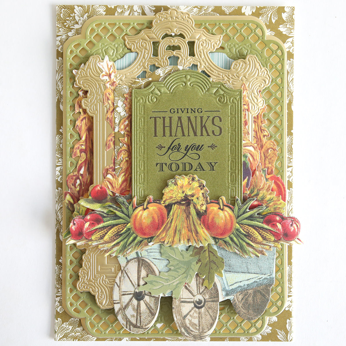 Handmade card with ornate gold borders, fruits, vegetables, and wheels, featuring the message “Giving Thanks for you Today” in the center—perfect for expressing heartfelt thank you sentiments. Finished using premium papercrafting supplies and delicate With Gratitude Sentiment Rub Ons.