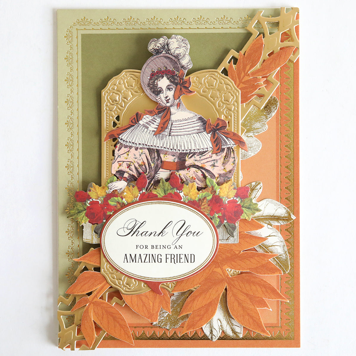 Greeting card featuring a vintage illustration of a woman along with gold and orange leaf designs and the message “Thank You for Being an Amazing Friend.” The Holiday Photo Mat and Card Layer Bundle is perfect for card making or scrapbooking—pair these designs with seasonal photo mats to create memorable keepsakes.