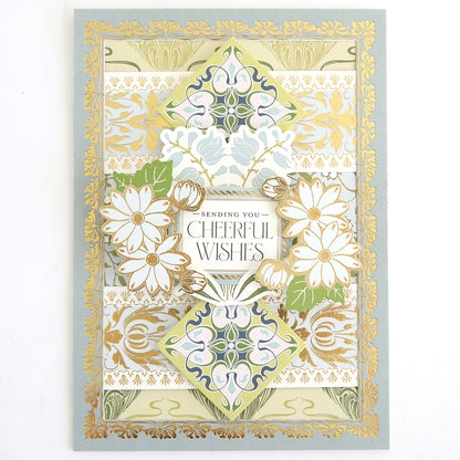 Infuse inspiration into your handmade cards or scrapbook pages with the Dahlia Ultimate Papercrafting Collection—featuring ornate gold and pastel floral designs, delicate white daisies, and the heartfelt message “Sending You Cheerful Wishes” at the center.