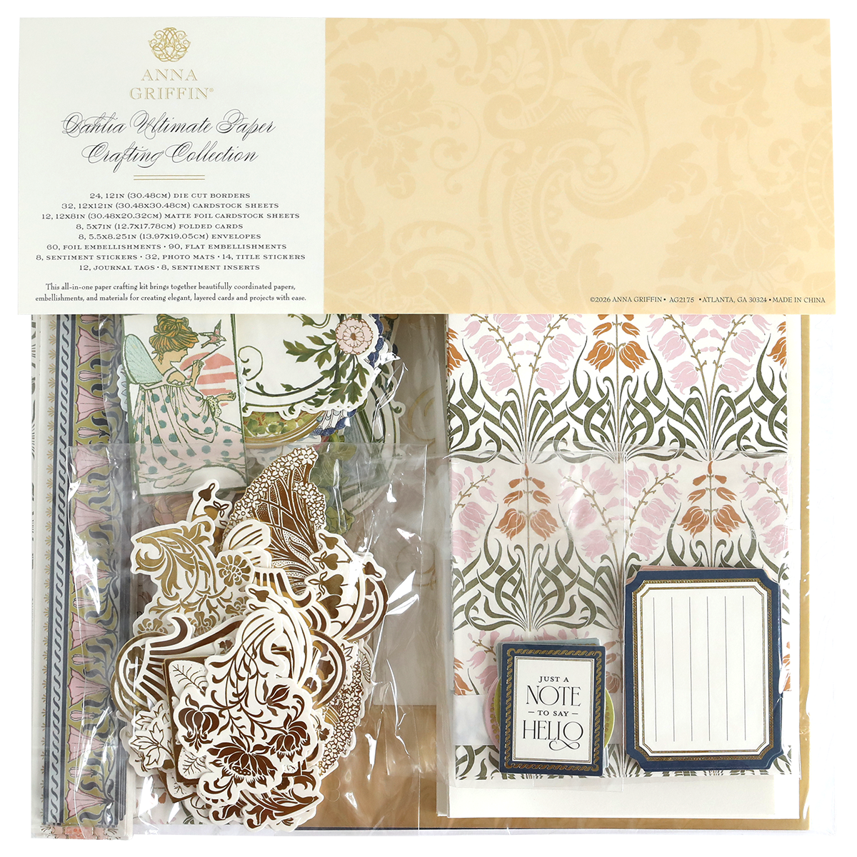 The Dahlia Ultimate Papercrafting Collection kit features patterned papers, ornate die-cuts, tags, and embellishments in clear packaging—perfect for creating beautiful scrapbook pages and handmade cards.