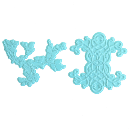 Two ornate, light blue plastic embossing folders with intricate designs—perfect for paper crafting or use alongside Flourish and Vine Gilded Hot Foil Plates—are displayed on a plain white background.