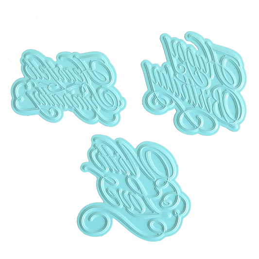 Three light blue metal Heartfelt Calligraphy Gilded Hot Foil Plates with raised calligraphy reading “Happy Birthday,” “Happy Birthday,” and “With Love.”