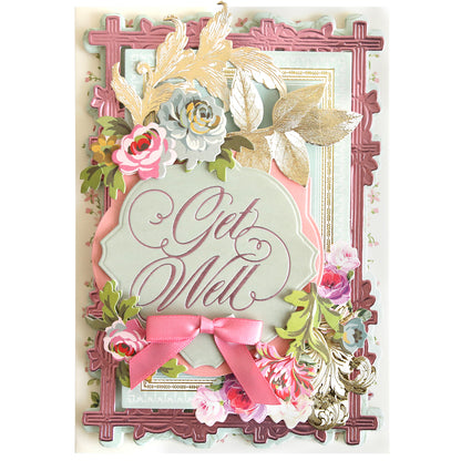 Get Well card featuring an ornate Thoughtful Calligraphy Gilded Hot Foil Plates rectangular frame, layered paper floral die-cuts, and a pink ribbon bow.