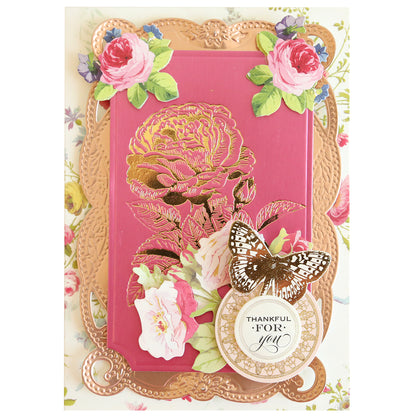 Decorative card created with the Rose and Pineapple Gilded Hot Foil Plates and Perfect Palette Pastel Hot Foil, featuring pink and white roses, a gold butterfly, and a round tag reading “Thankful for you” on a floral-patterned background.