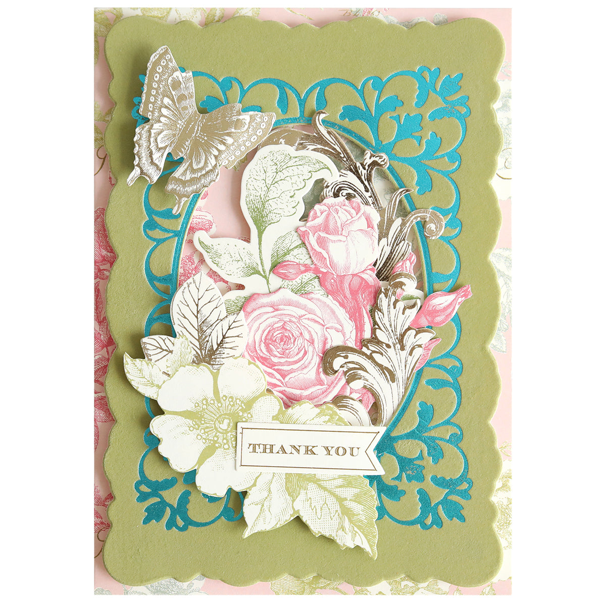 Greeting card featuring the Oval Flourish Frame Gilded Hot Foil Plate, showcasing a floral and butterfly design with an ornate blue oval flourish frame and a gold ‘Thank You’ banner in the center—ideal for handmade cards or pairing with your favorite hot foil plate techniques.