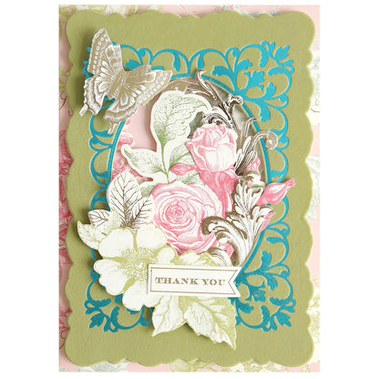 Greeting card featuring the Oval Flourish Frame Gilded Hot Foil Plate, showcasing a floral and butterfly design with an ornate blue oval flourish frame and a gold ‘Thank You’ banner in the center—ideal for handmade cards or pairing with your favorite hot foil plate techniques.