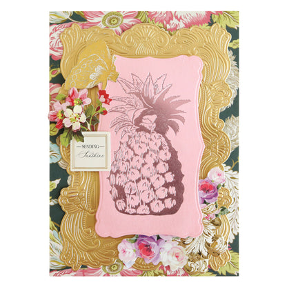The Rose and Pineapple Gilded Hot Foil Plates feature a gold frame, pink center with a charming pineapple illustration, floral accents, and an included small card that reads “Sending Hugs.” Ideal for handmade cards and papercrafting projects, this design pairs beautifully with hot foil plates to add an extra touch of elegance.