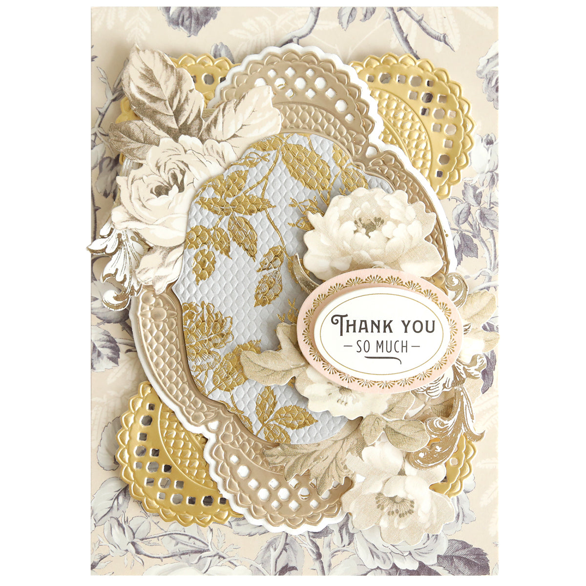 Craft an elegant floral card with layered gold and cream die-cut designs using the Oval Pattern 3D Layer Dies. Featuring embossed details and delicate white flowers, this card displays a graceful oval label reading “Thank you so much” atop a muted floral background—perfect for card makers passionate about sophistication and style.