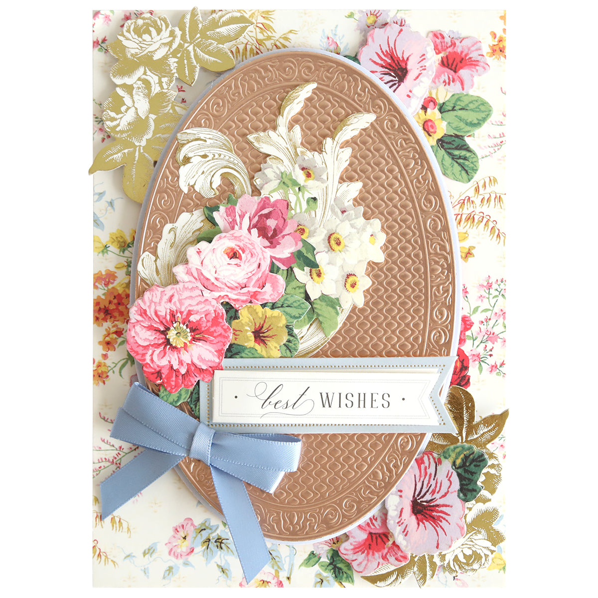 Showcasing exquisite embossed detail created with the Oval Pattern 3D Layer Dies, this greeting card features an elegant oval design adorned with pink and white flowers, shimmering gold floral accents, a delicate blue ribbon bow, and a “Best Wishes” label set against a floral background. Ideal for card making enthusiasts.
