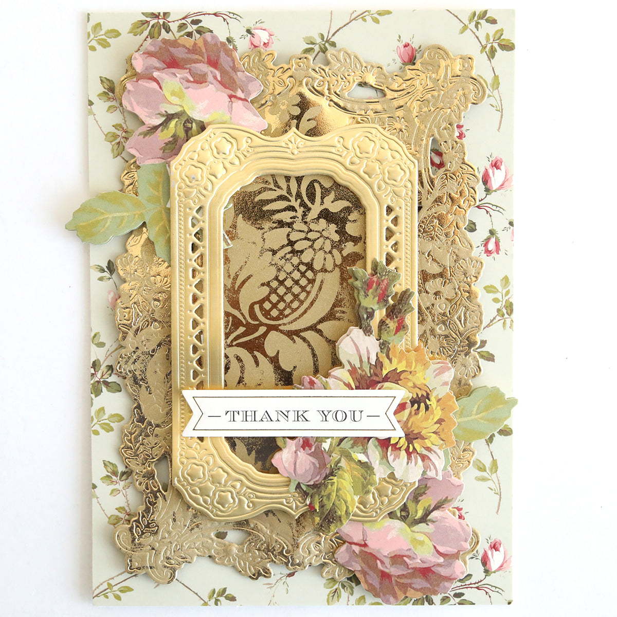 Create elegant thank you cards using the Gilded Solid Foil Plate 4x6, featuring gold embossed frames and layered paper flowers—ideal for hot foil or metallic backgrounds with a floral patterned banner reading “Thank You.”.