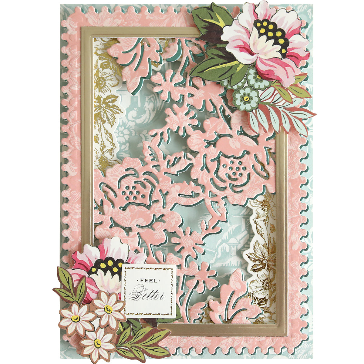 Handmade greeting card featuring pink and white layered floral cutouts created with the Bird and Floral Card Front Dies, highlighted with gold accents and a “Feel Better” sentiment in the bottom left corner.