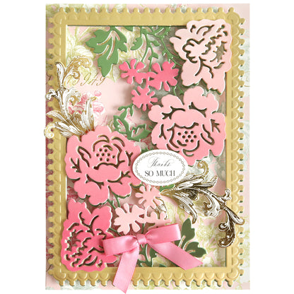 A decorative card created with the Bird and Floral Card Front Dies, featuring layered pink and gold floral cutouts, a pink ribbon bow, and the message “Thank you SO MUCH” in the center.