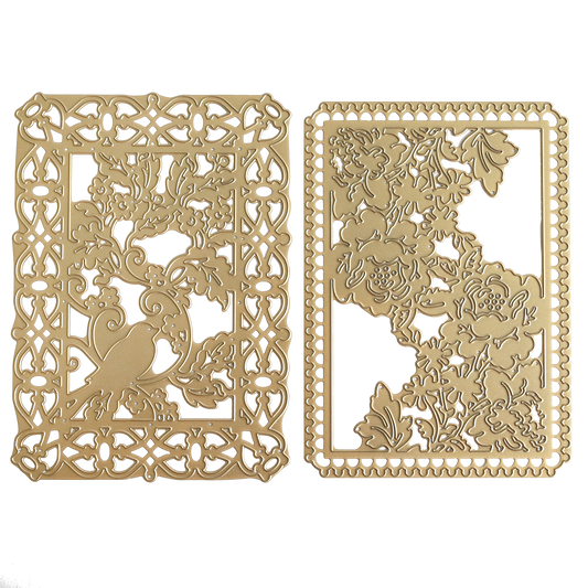 Showcasing the Bird and Floral Card Front Dies, this set includes two gold, intricately cut metal cards: one depicts a bird perched in a leafy tree, while the other features an elegant floral pattern with overlapping flowers and leaves—both exquisitely crafted for precise detail using these decorative cutting dies.