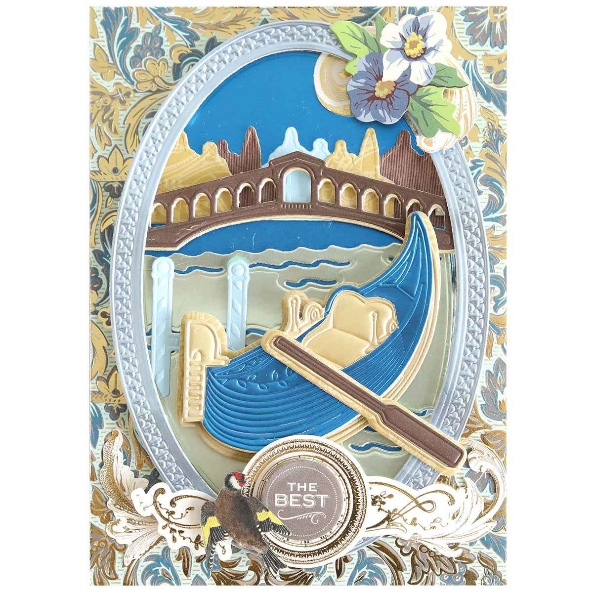 Showcasing a blue gondola gliding on the water with a bridge, moon, mountains, and flowers in the background—all artfully constructed with dimensional die cuts—the Gondola 3D Scene Dies create an eye-catching decorative card. A round emblem inscribed with “THE BEST” adorns the bottom center, making this product ideal for Venice-inspired paper crafting fans.
