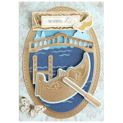 The Gondola 3D Scene Dies set features dimensional die cuts of a gondola gliding on water, a bridge, delicate butterflies, and the sentiment “Sending love” at the top—perfect for Venice-inspired paper crafting projects.