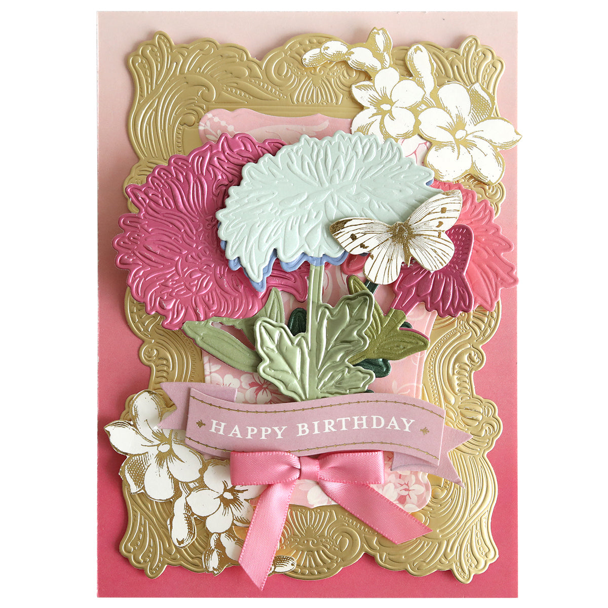 Greeting card created with Dahlia, Mum, and Sunflower 3D Floral Dies features an embossed gold frame, intricate botanical details with flowers and a butterfly, and a pink ribbon bow. A “Happy Birthday” banner is displayed across the center.