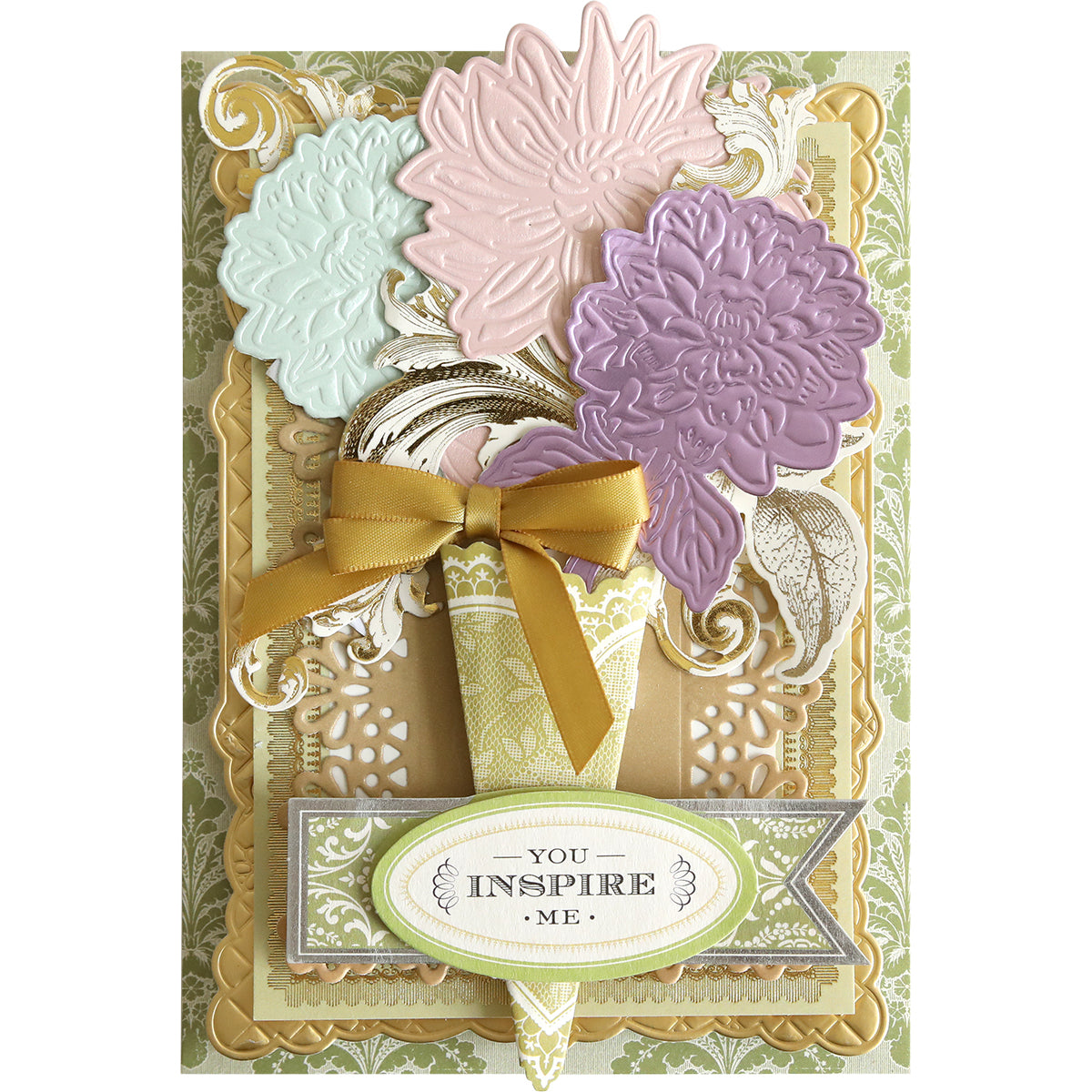 Featuring the Dahlia, Mum, and Sunflower 3D Floral Dies, this greeting card showcases exquisite embossed blooms, delicate gold accents, a cheerful yellow ribbon, and a decorative “You inspire me” label on a patterned background—perfect for paper craft enthusiasts who appreciate intricate botanical detail.