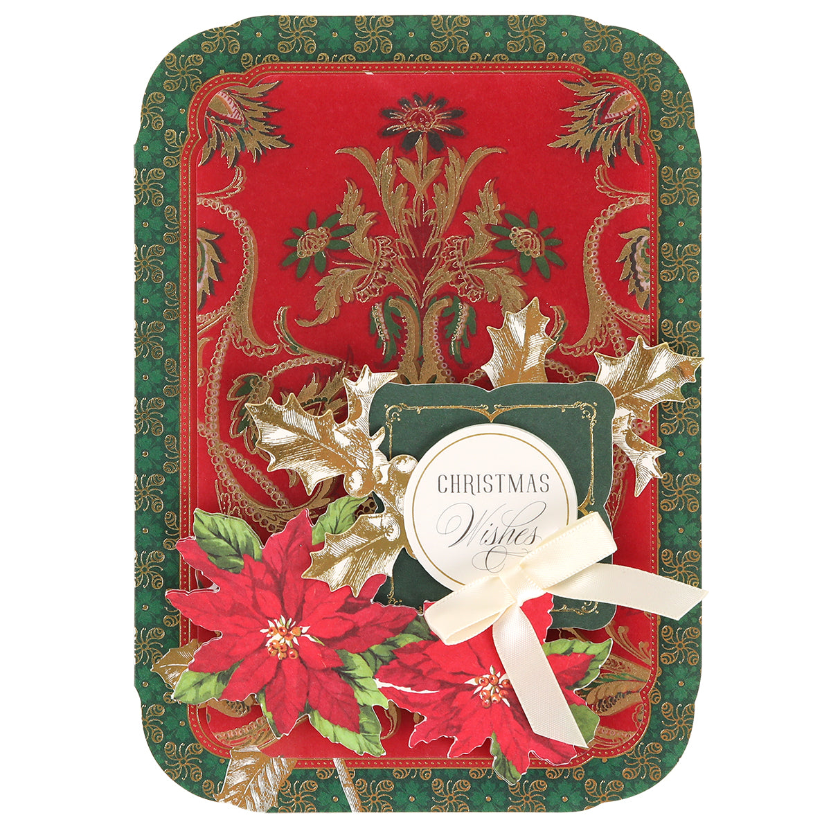 The Simply Merry Christmas Card Making Kit includes red and green cards with gold details, poinsettias, holly leaves, a white ribbon, and a “Christmas Wishes” tag.
