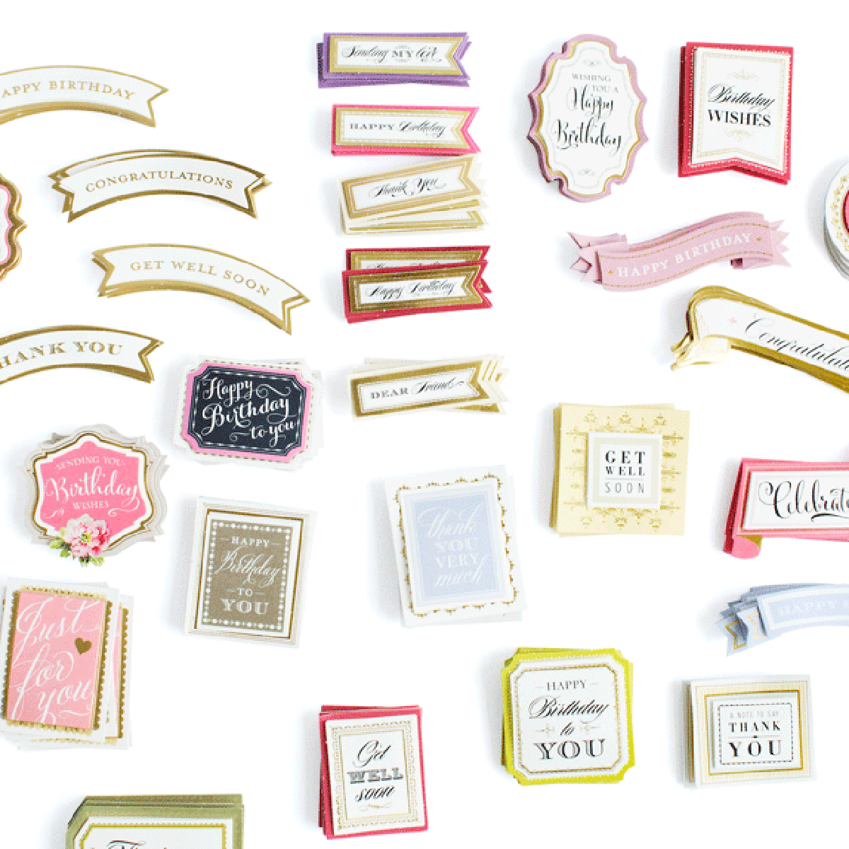 A collection of decorative greeting card embellishments from the Beautiful Botanical Bundle, perfect for layered card making, with messages such as “Happy Birthday,” “Get Well Soon,” “Thank You,” and “Congratulations” displayed on a white background. Some pieces showcase vintage charm inspired by antique botanical rub on transfers, adding an elegant touch to your heartfelt creations.