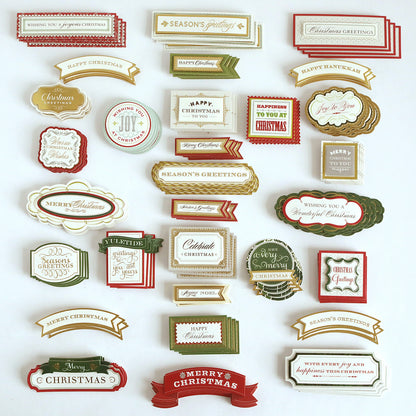 A set of Favorite Christmas Sentiment Stickers featuring festive holiday greetings in red, green, gold, and white, all neatly arranged on a white background.