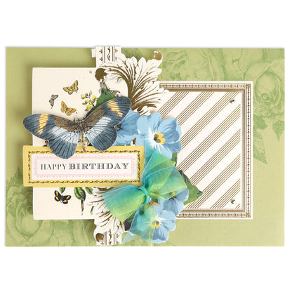 A Birthday Perfect Pattern Cards and Envelopes 5x7 card base birthday card featuring a blue butterfly, blue flowers, a green ribbon, and a “Happy Birthday” message on an ornate green floral background.