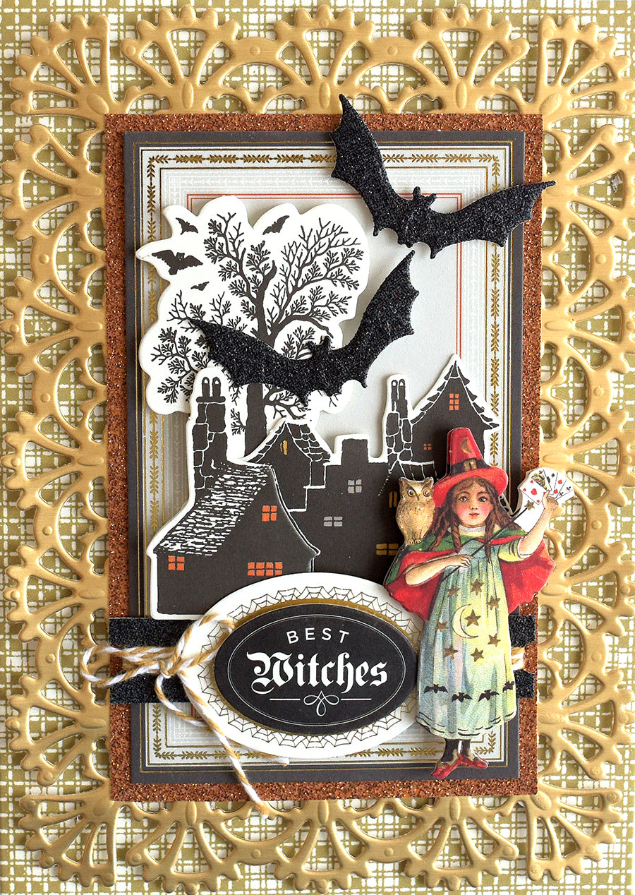Introducing the “Haunted Halloween Haul” — a handmade Halloween card showcasing a “Best Witches” label, bats, a witch with an owl, and a vintage-style house scene, all beautifully framed by decorative gold and brown borders. Crafted with premium Halloween supplies and adorned with glitter cardstock for an extra festive sparkle.
