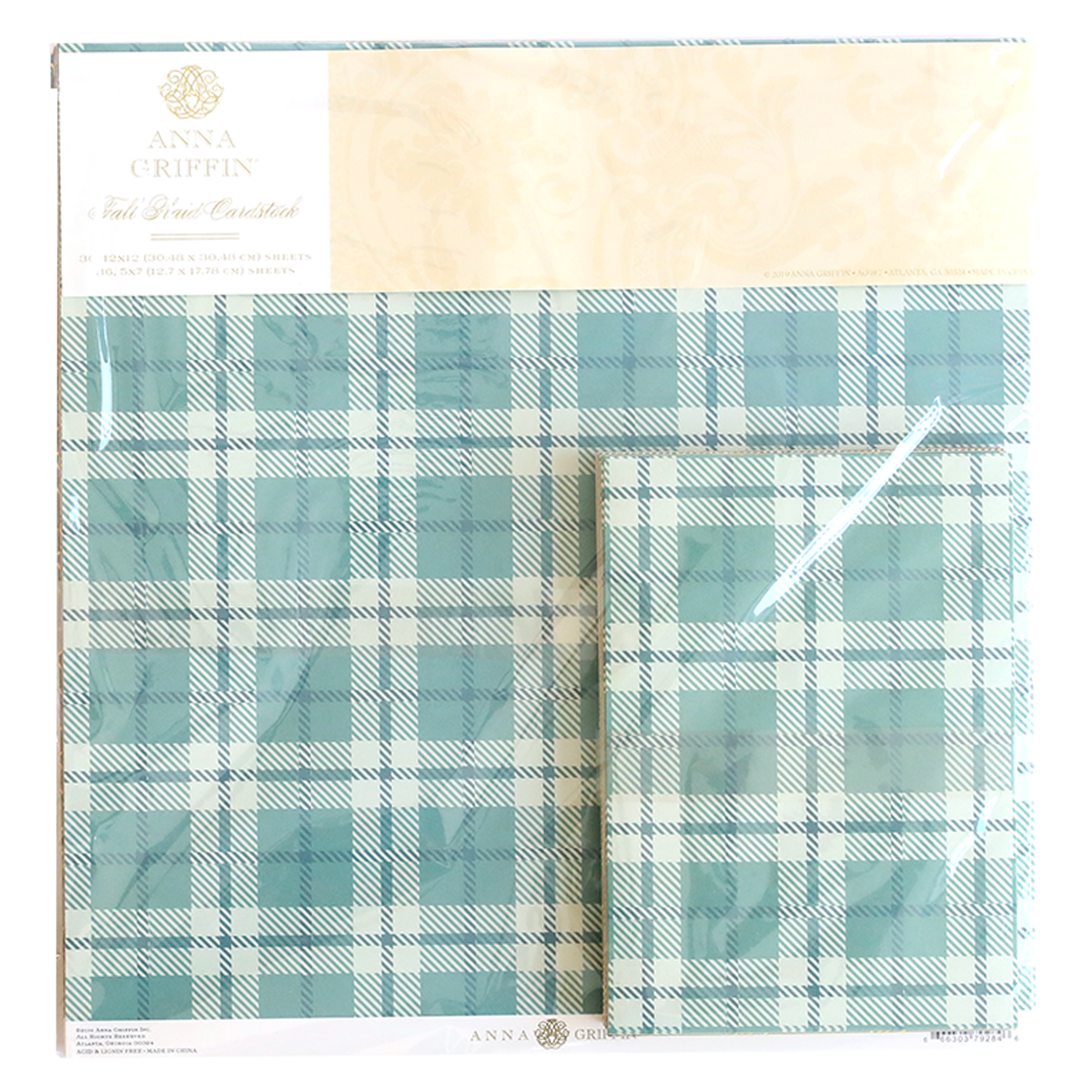 A blue and white Fall Plaid Cardstock pattern in an Anna Griffin package.