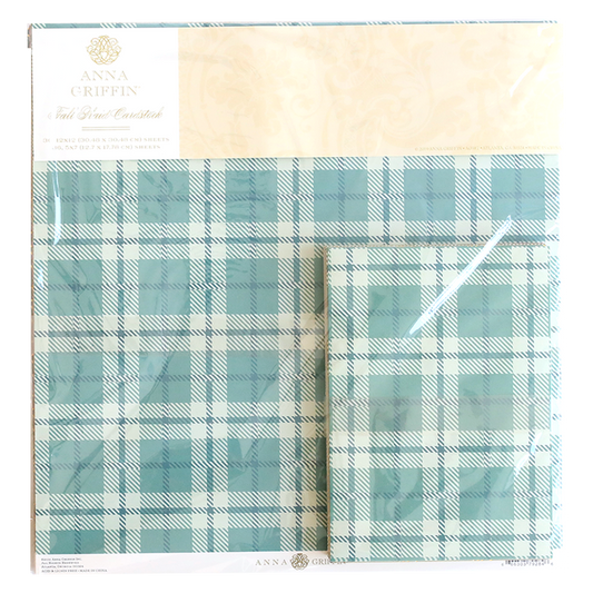 A blue and white Fall Plaid Cardstock pattern in an Anna Griffin package.
