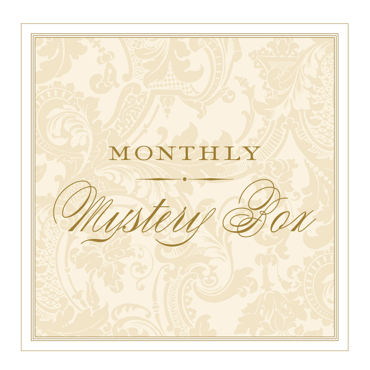 An ornate beige and gold label with the words "Monthly Mystery Box" in elegant script font, featuring exclusive Anna Griffin products.
