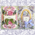 Two ornate greeting cards surrounded by floral decorations. One card sends birthday greetings with a green bow; the other mentions an important day with a purple bow.