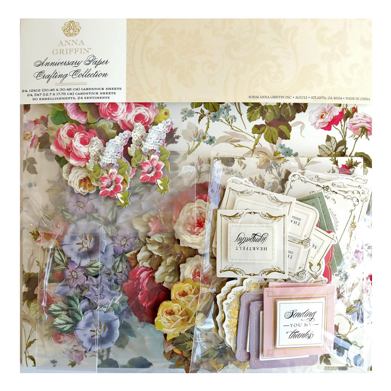 A package containing the Anniversary Paper Crafting Collection, a variety of floral designs and double sided cardstock.