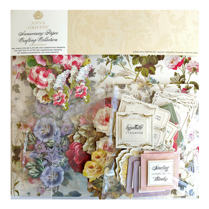 A package containing the Anniversary Paper Crafting Collection, a variety of floral designs and double sided cardstock.
