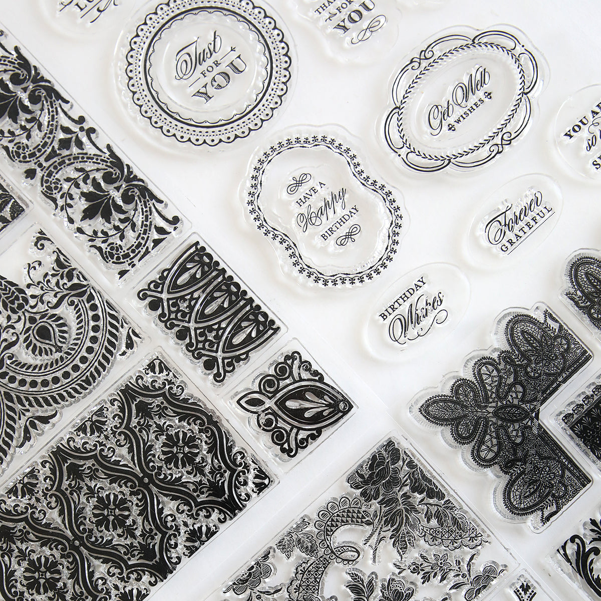 A collection of black and white stamps, including the Anniversary Stamp Set.