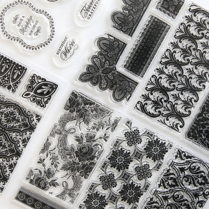 An Anniversary Stamp Set featuring black and white designs, including background and border elements.
